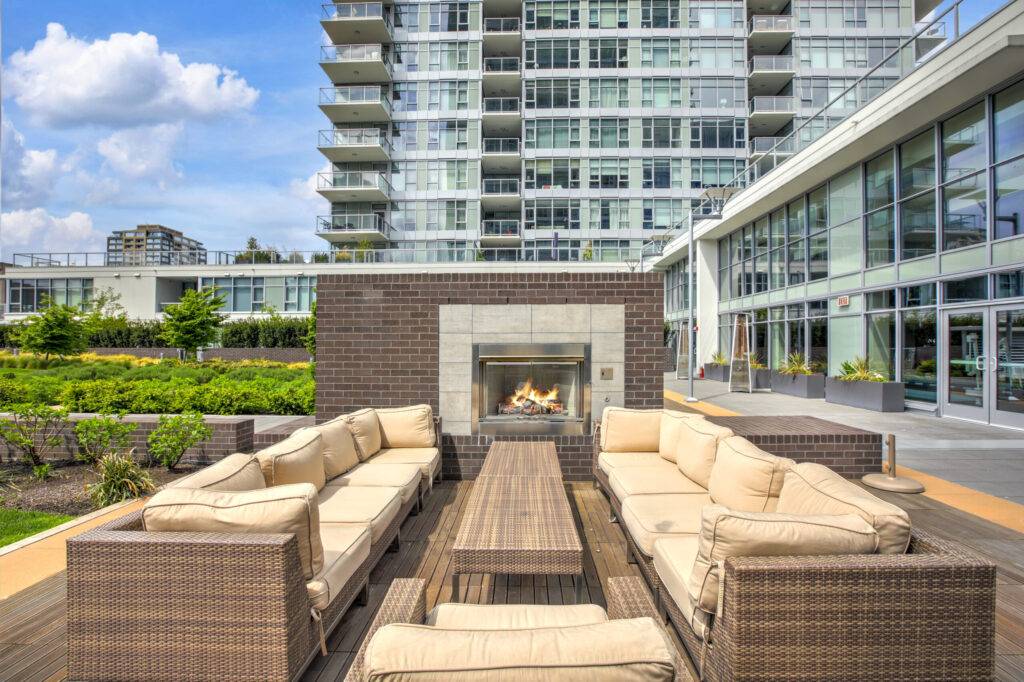 Luxury apartment building with open-air park.